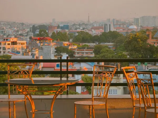 Chairs on the hotel terrace with a view over the city