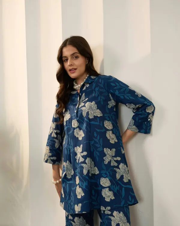 A woman in an indigo floral block-print co-ord set