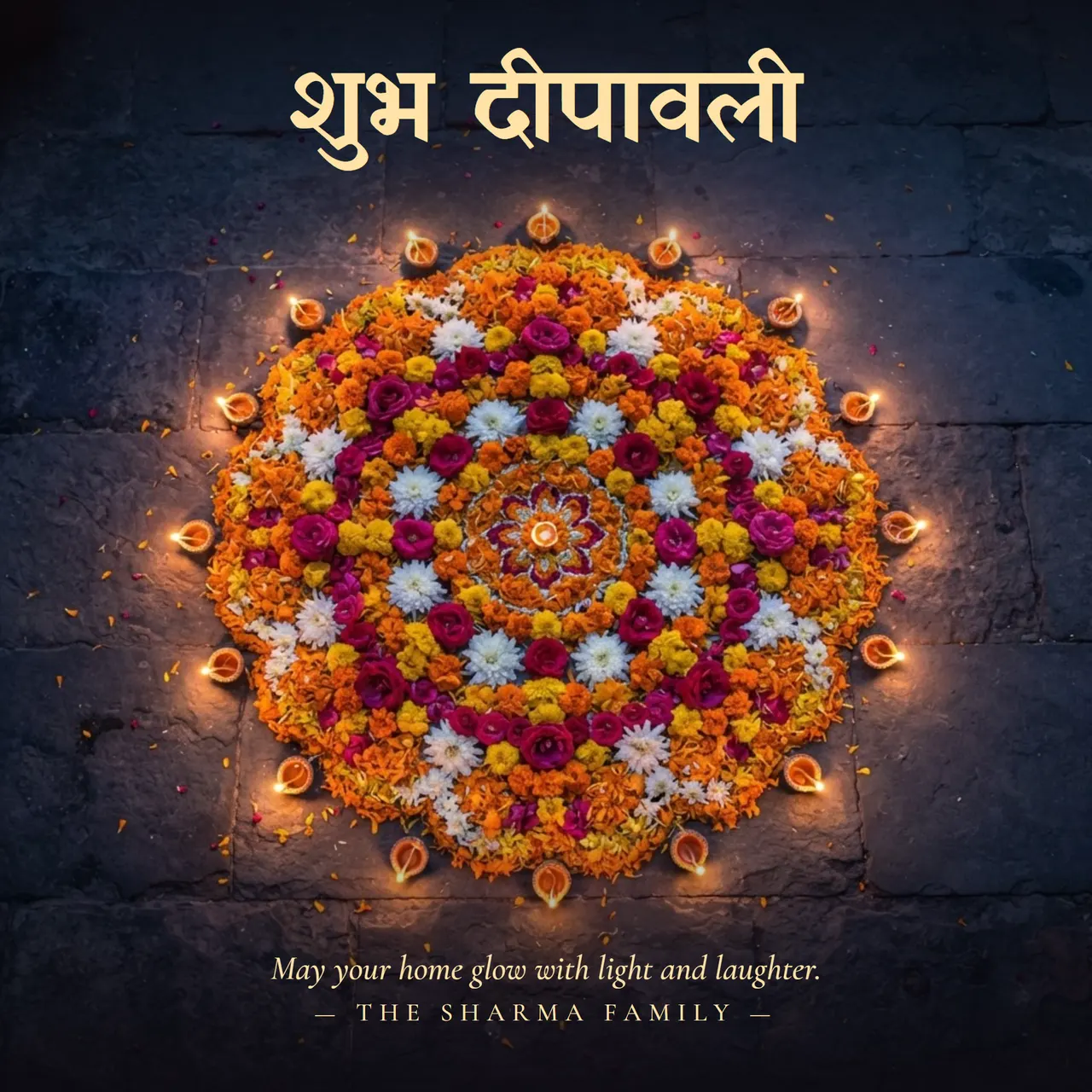 Diwali greeting with Hindi lettering over a flower rangoli surrounded by lit diyas