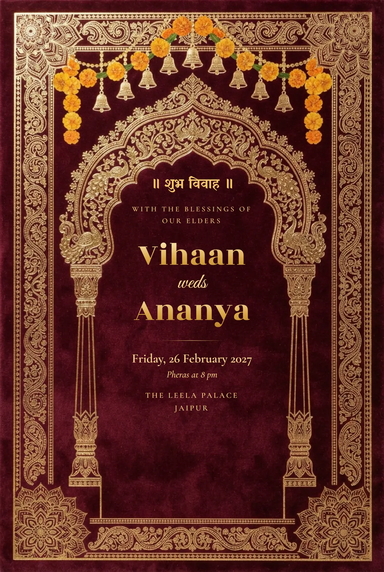 Royal maroon wedding invitation with an ornate gold-foil jharokha arch, hanging bells and marigolds